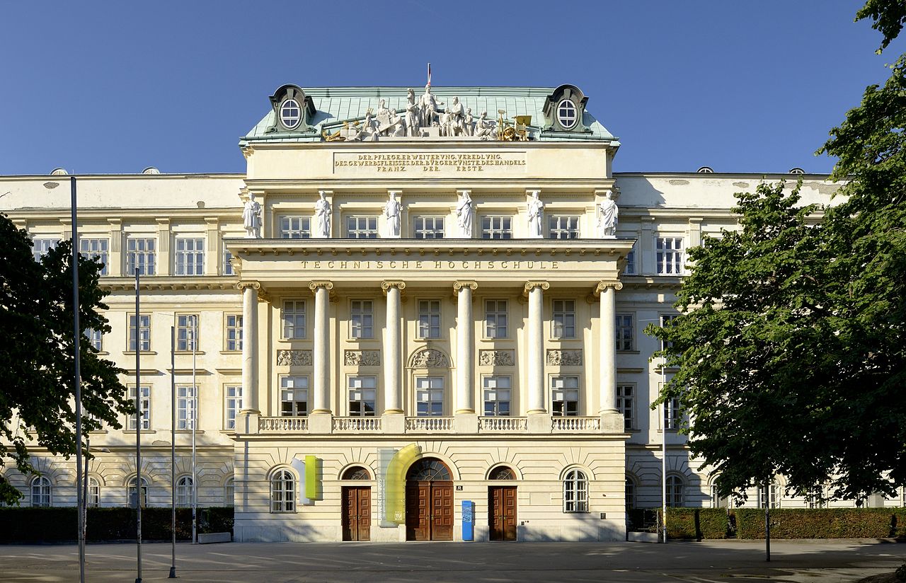 Hauptgebäude der Technischen Universität Wien; rechts und links im Bild die beiden unter Schutz stehenden Baumhaseln